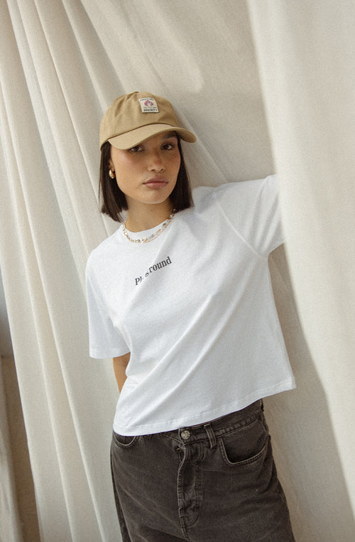 Gewaschenes weißes T-Shirt „Naughty Puppies“