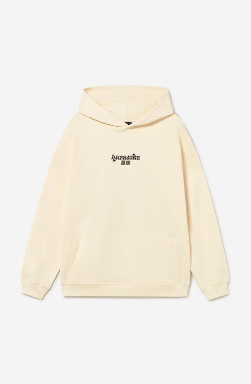 Sudadera oversize color ivory con capucha, estampado Harajuku en el pecho y gráfica trasera con tigres, flores y detalles de inspiración japonesa.