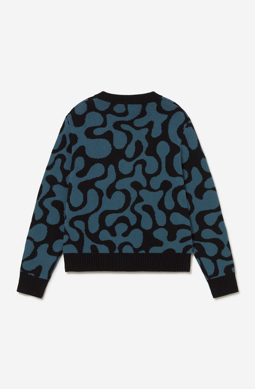 Cardigan unisex de punto con diseño jacquard azul y negro.
