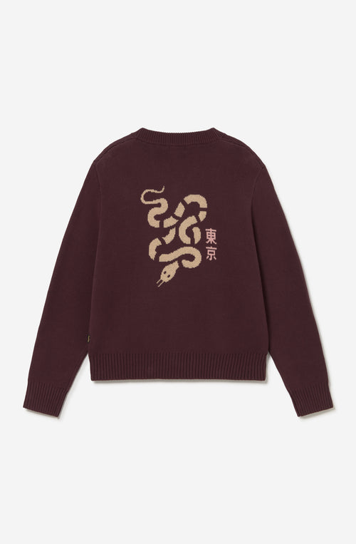 Cardigan unisex de punto marrón con botones, bordado Kaotiko Society en el pecho y gran jacquard de serpiente con detalles inspirados en Japón en la espalda.