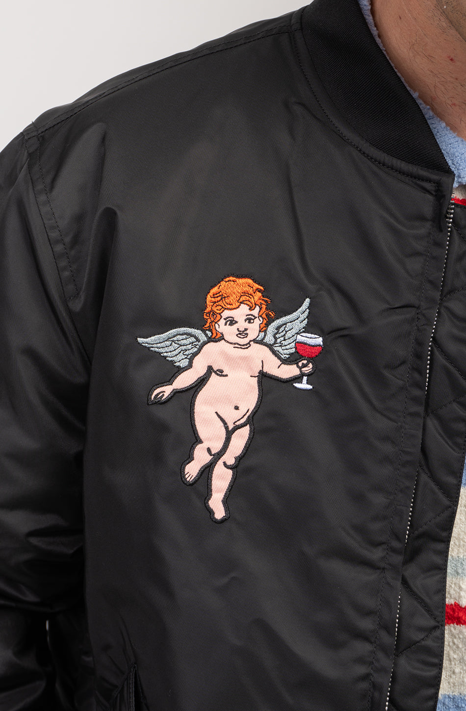 Schwarze Jacke mit Liebestrank